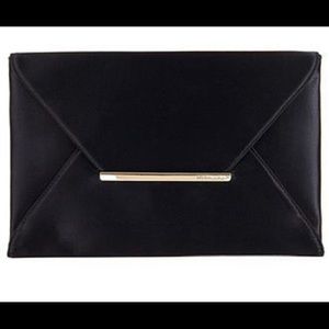 BCBG MaxAzria satin envelope clutch